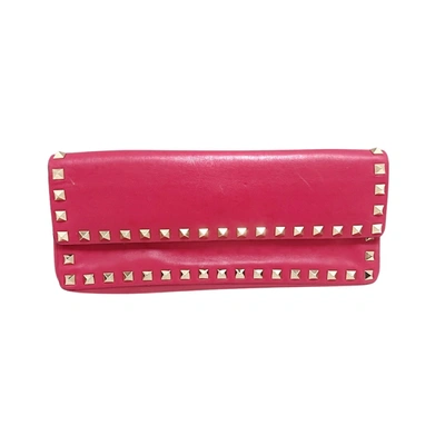 Shop Valentino Rockstud Leather Clutch Bag () In Pink