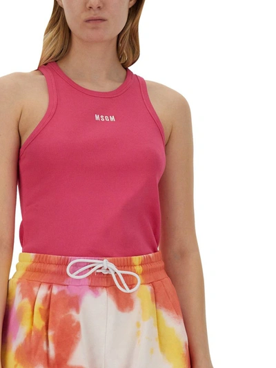 Shop Msgm Tops With Logo In Fuchsia