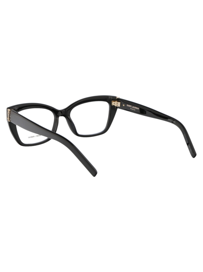 Shop Saint Laurent Sl M117 Glasses In 001 Black Black Transparent