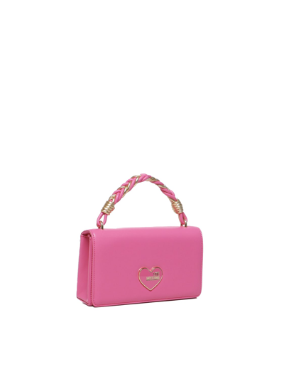 Shop Love Moschino Handheld Handbag With Chain Shoulder Strap In Fuxia