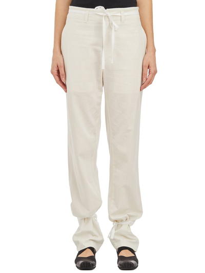 Shop Lemaire Chambray Drawstring Tapered Trousers In White