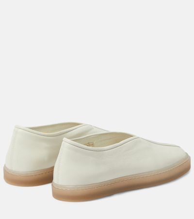 Shop Lemaire Piped Leather Loafers In White
