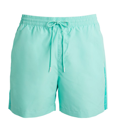 Shop Calvin Klein Contrast Logo Swim Shorts In Blue