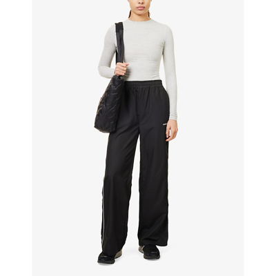 Shop Adanola Women's Black Logo-print Contrast-piping Relaxed-fit Shell Trousers