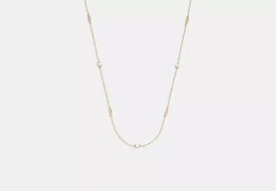 Shop Coach Outlet Classic Pearl Long Necklace In Gold/neutral