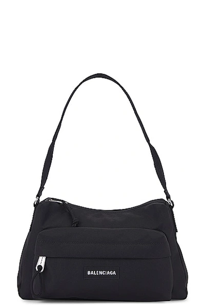Shop Balenciaga Explorer Sling Pouch Bag In Black