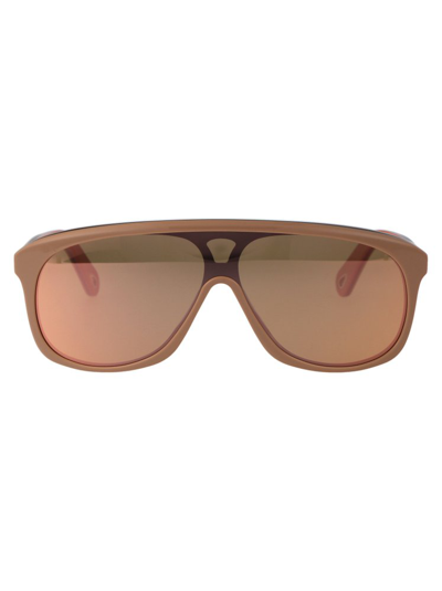 Shop Chloé Eyewear Aviator Frame Sunglasses In Beige