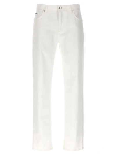 Shop Dolce & Gabbana Logo Plaque Jeans In White