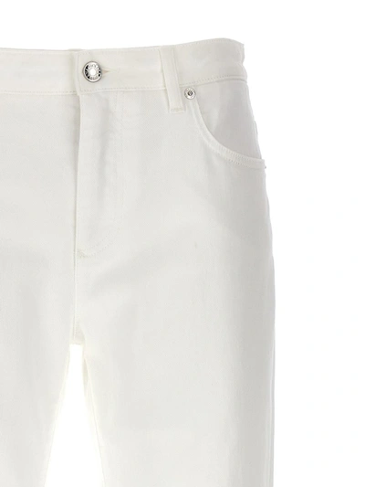 Shop Dolce & Gabbana Logo Plaque Jeans In White