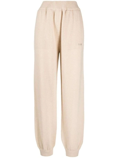 Shop Msgm Beige Embroidered-logo Knitted Track Pants In Neutrals
