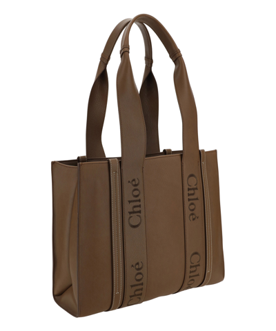 Shop Chloé Woody Tote Bag In Brown