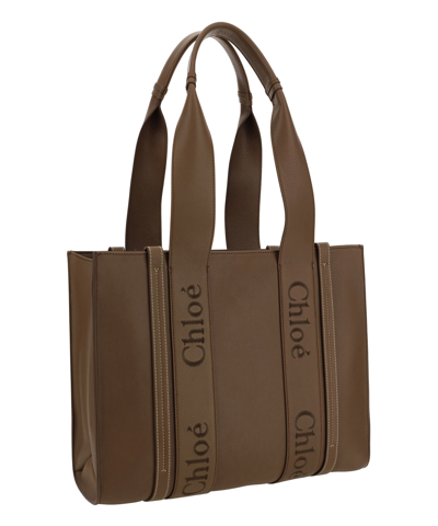 Shop Chloé Woody Tote Bag In Brown