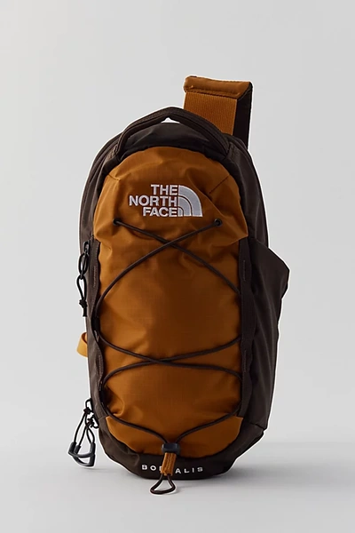 Shop The North Face Borealis Sling Bag In Brown/black, Women's At Urban Outfitters