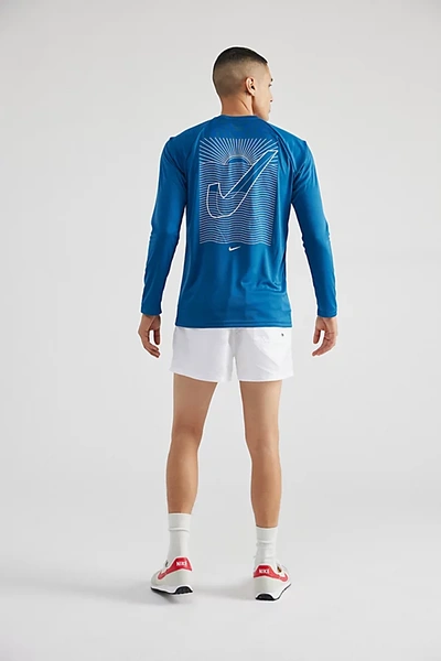 Shop Nike Swoosh At Sea Long Sleeve Tee In Blue, Men's At Urban Outfitters