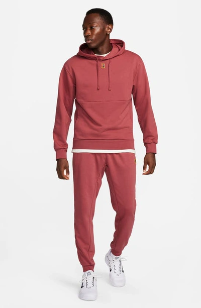 Shop Nike Court Heritage French Terry Joggers In Cedar