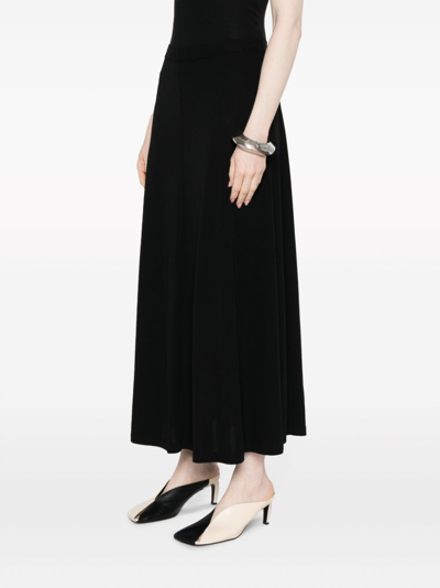 Shop Totême Fluid Jersey Skirt In Black
