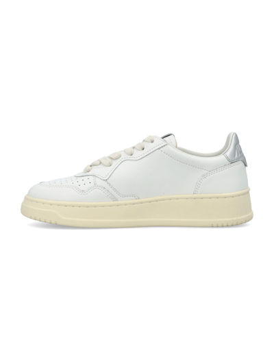 Shop Autry Medalist Low Woman Sneakers In White/silver