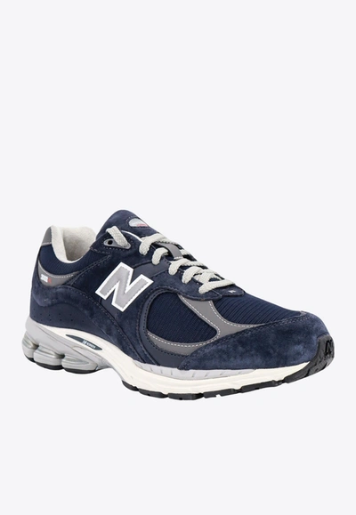 Shop New Balance 2002rx Low-top Sneakers In Blue