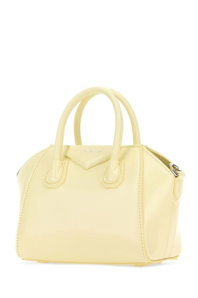 Shop Givenchy Woman Pastel Yellow Leather Toy Antigona Handbag
