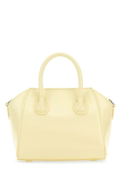 Shop Givenchy Woman Pastel Yellow Leather Toy Antigona Handbag