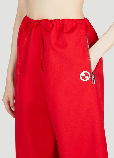 Shop Gucci Women Round Interlocking G Track Pants In Red