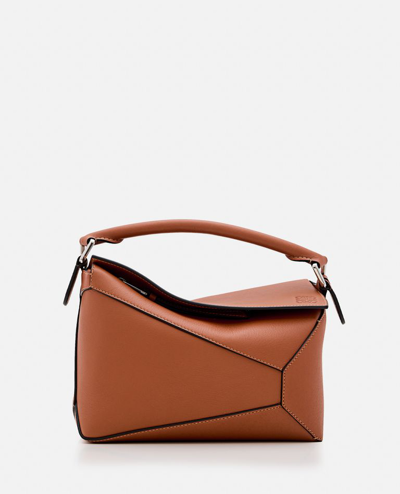 Shop Loewe Small Puzzle Edge Leather Handbag In Brown