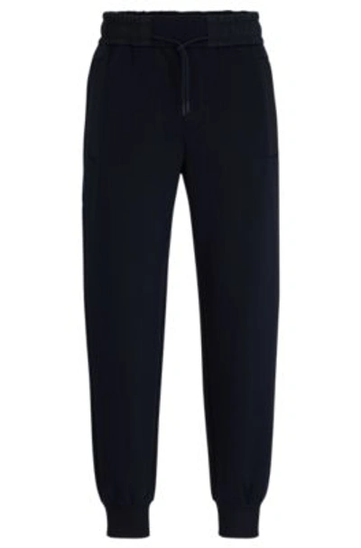 Shop Hugo Boss Tracksuit Bottoms With Mesh Trims In Dark Blue