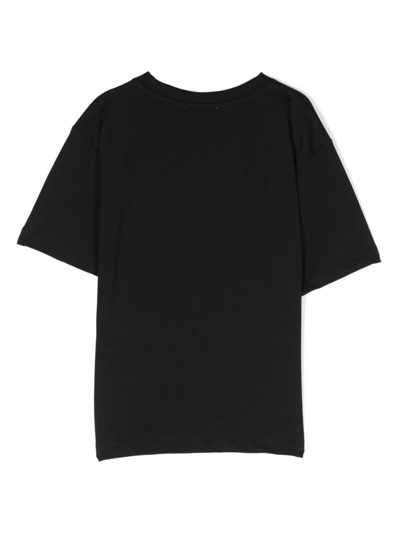 Shop Moschino T-shirt Con Stampa In Black