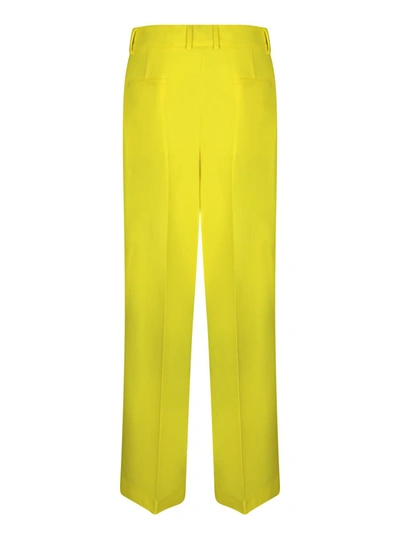 Shop Msgm Trousers In Yellow
