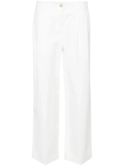Shop Totême Pants In White