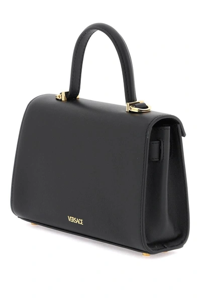 Shop Versace Small Medusa '95 Handbag In Black
