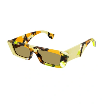 Shop Gucci Gg1625s Linea Lettering- Special Edition Sunglasses In 001 Yellow