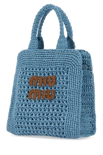 Shop Miu Miu Handbags. In Blue