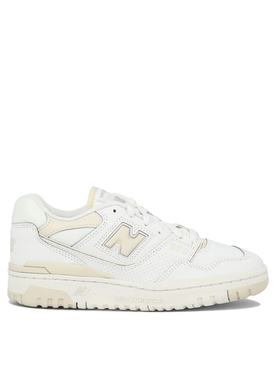 Shop New Balance "550" Sneakers In White