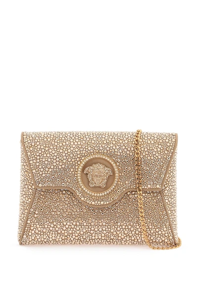 Shop Versace La Medusa Envelope Clutch With Crystals Women In Cream
