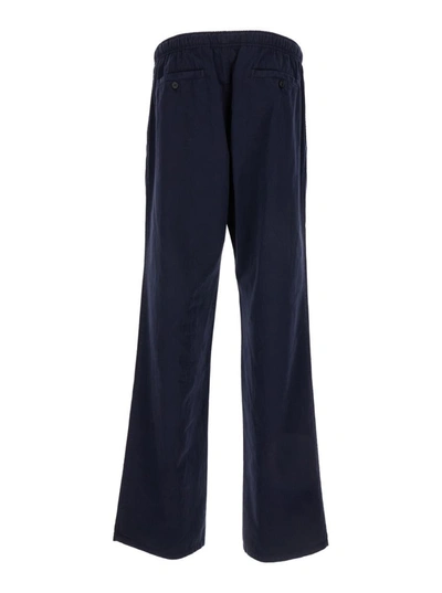Shop Palm Angels Blue Flared Trousers In Cotton Man