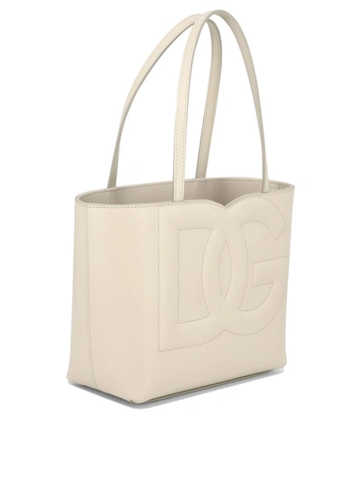 Shop Dolce & Gabbana "dg" Shoulder Bag In Ivory