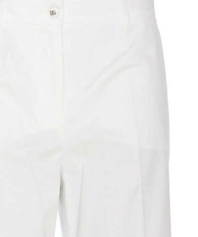 Shop Dolce & Gabbana Trousers In White
