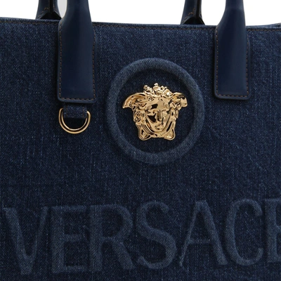 Shop Versace Bags In Navy Blue- Gold