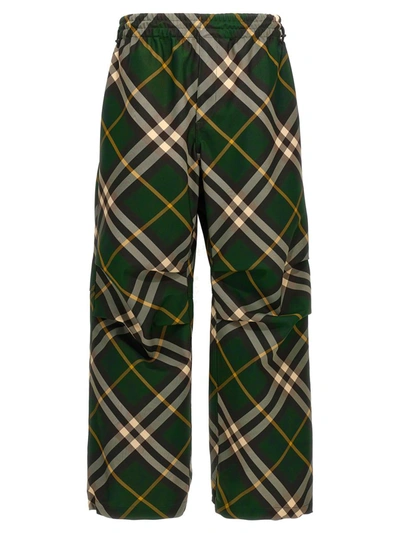 Shop Burberry Check Pants In Green