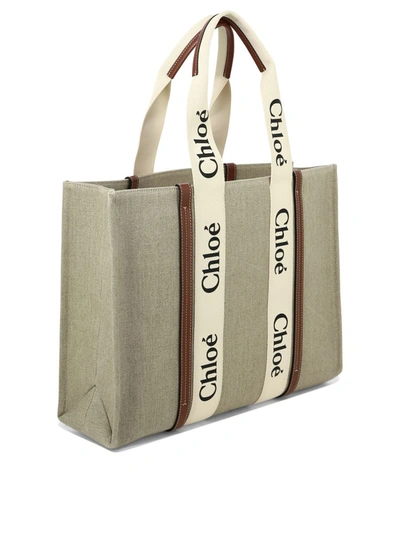 Shop Chloé "woody Large" Shoulder Bag In Beige
