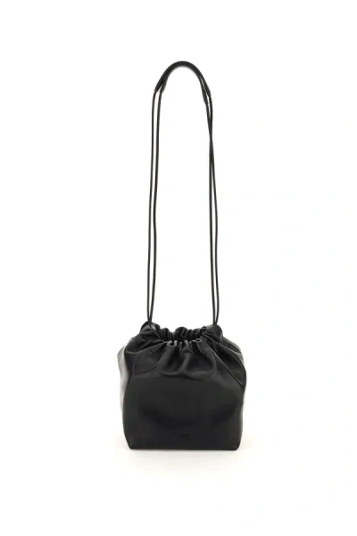 Shop Jil Sander Dumpling Crossbody Bag In Black