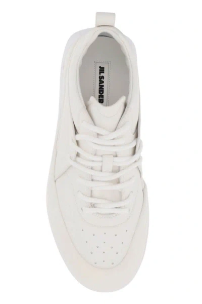 Shop Jil Sander Orb Sneakers In White