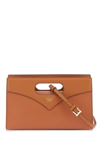 Shop Mcm Diamond Handbag In Brown