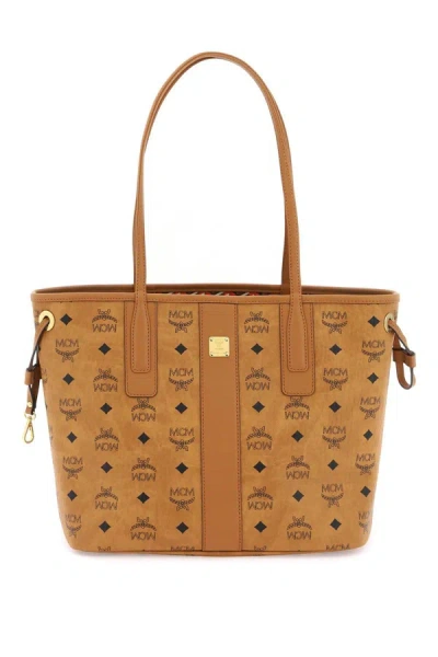Shop Mcm Liz Reversible Bag In Brown