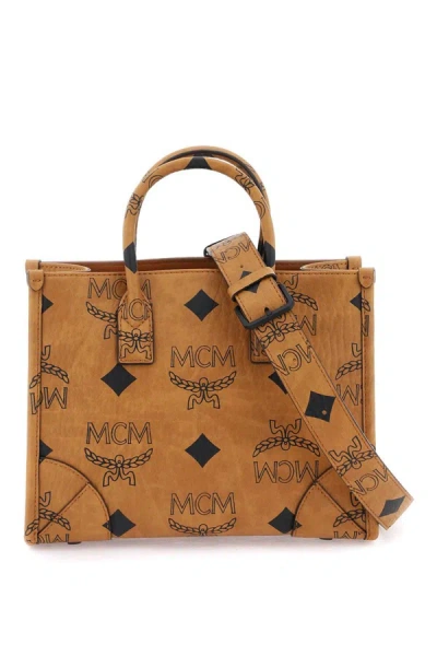 Shop Mcm Munchen Small Tote Bag In Brown