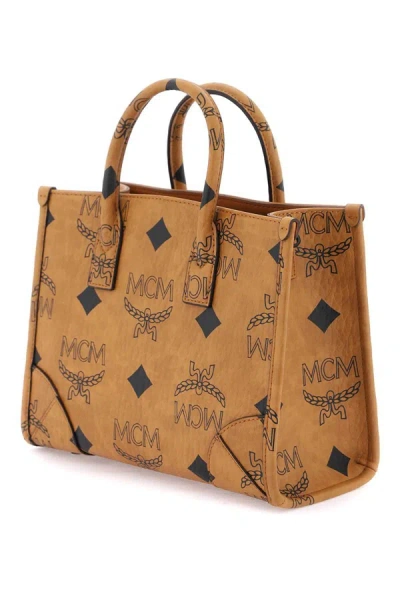Shop Mcm Munchen Small Tote Bag In Brown
