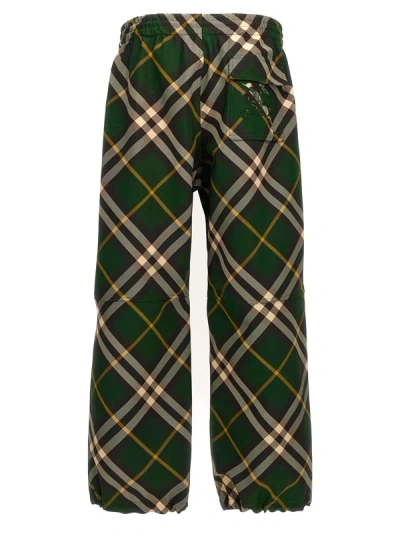 Shop Burberry Check Pants Green