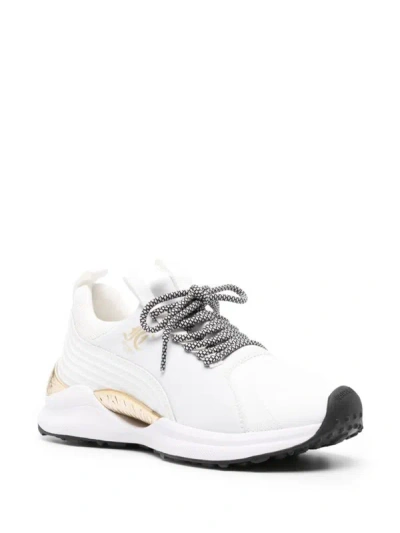 Shop Just Cavalli Sneakers In White