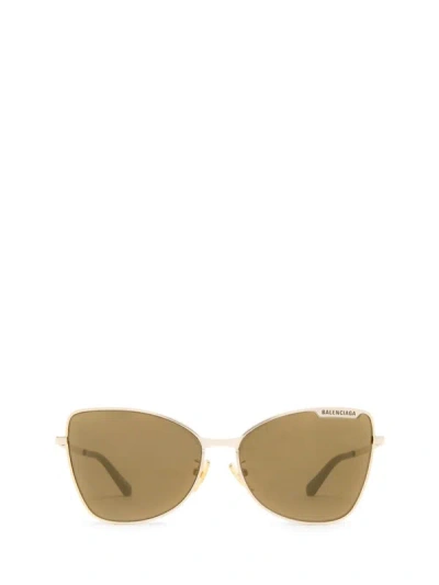 Shop Balenciaga Sunglasses In Gold